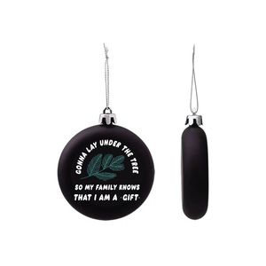 “Gonna lay under the tree so my family knows I’m a gift” glass holiday ornament